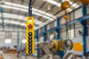 Movement remote control pendant switch for overhead crane in the factory shutterstock_196152710-300x200